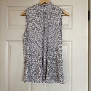 Black and white polka dots. Size medium tank blouse. Perfect for work!